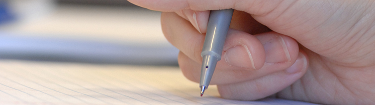 closeup of hand with pen